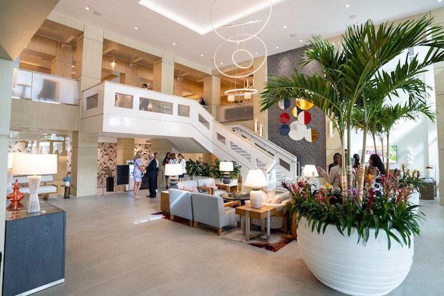 903 Bridgewood Pl, Boca Raton, FL 33434 - building lobby with a high ceiling and stairway