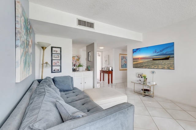 903 Bridgewood Pl, Boca Raton, FL 33434 - living area with light tile patterned flooring and a textured ceiling