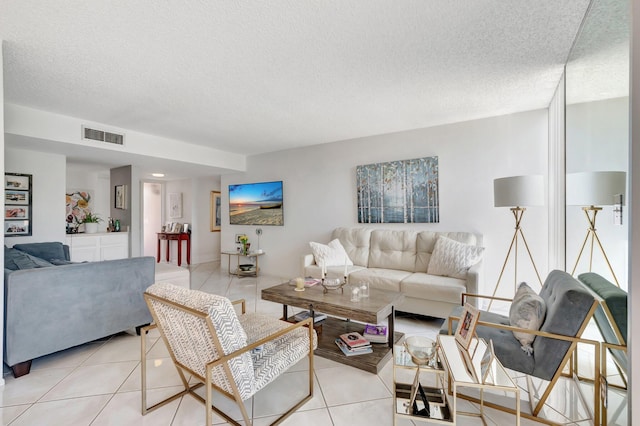 903 Bridgewood Pl, Boca Raton, FL 33434 - living room featuring a textured ceiling and light tile patterned flooring