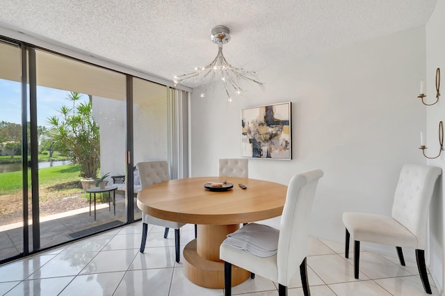 903 Bridgewood Pl, Boca Raton, FL 33434 - dining area with a chandelier, a water view, a textured ceiling, light tile patterned flooring, and expansive windows