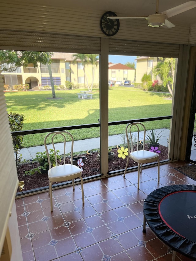 311 Pine Ridge Cir Unit B-1, Greenacres, FL 33463 - sunroom featuring a ceiling fan