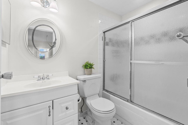266 Seville L, Delray Beach, FL 33446 - bathroom featuring vanity, toilet, and enclosed tub / shower combo