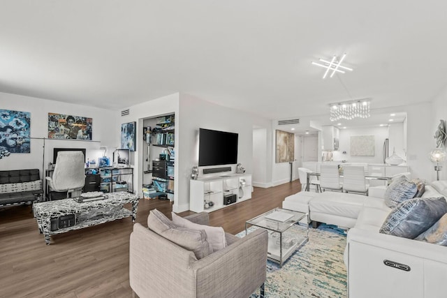 5500 NW 2nd Ave Unit 414, Boca Raton, FL 33487 - living area with a chandelier, wood finished floors, and baseboards