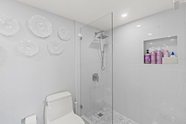 5500 NW 2nd Ave Unit 414, Boca Raton, FL 33487 - bathroom featuring a walk in shower and toilet