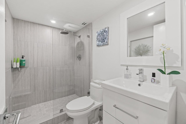 5500 NW 2nd Ave Unit 414, Boca Raton, FL 33487 - full bath featuring toilet, tiled shower, vanity, and recessed lighting