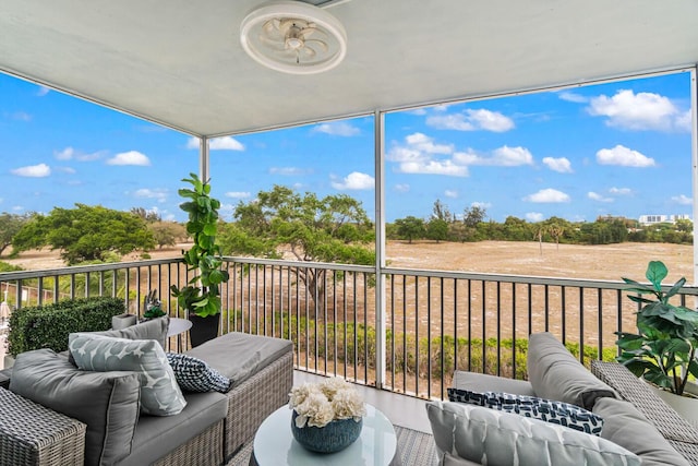 5500 NW 2nd Ave Unit 414, Boca Raton, FL 33487 - balcony featuring outdoor lounge area