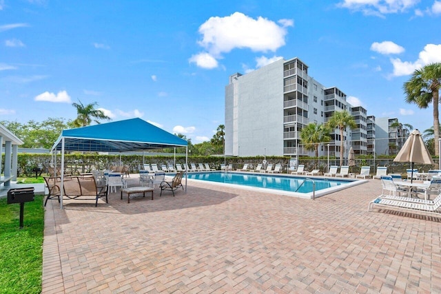 5500 NW 2nd Ave Unit 414, Boca Raton, FL 33487 - community pool with fence and a patio area