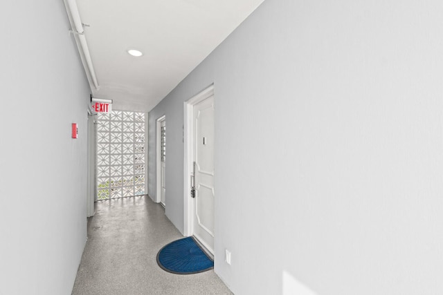 5500 NW 2nd Ave Unit 414, Boca Raton, FL 33487 - hall with carpet flooring and recessed lighting