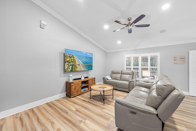living area featuring vaulted ceiling, ceiling fan, light wood-style flooring, recessed lighting, and baseboards
