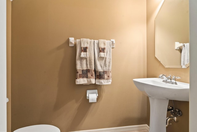 2149 SE Grand Dr, Port Saint Lucie, FL 34952 - bathroom featuring toilet and baseboards