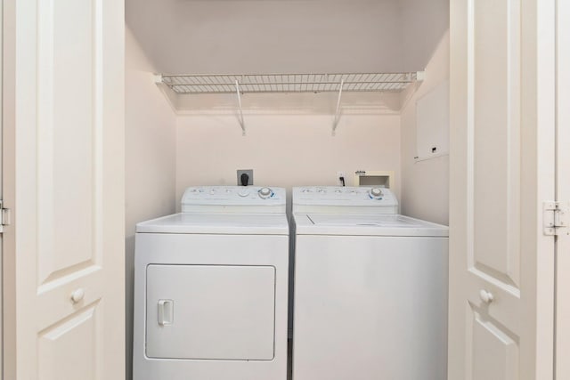 2149 SE Grand Dr, Port Saint Lucie, FL 34952 - clothes washing area with washing machine and dryer