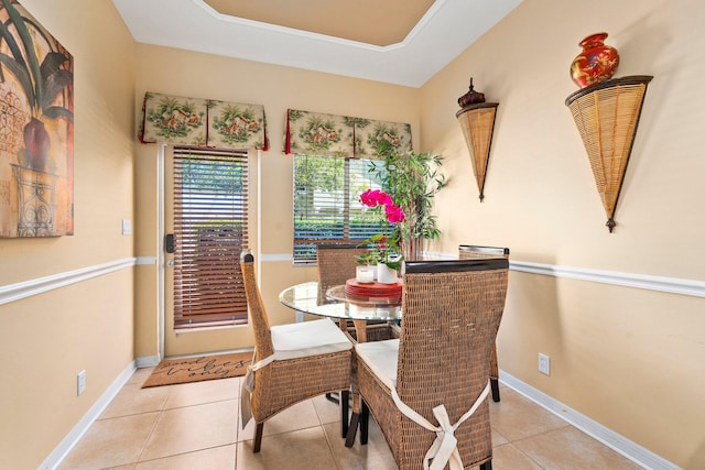 2149 SE Grand Dr, Port Saint Lucie, FL 34952 - tiled dining room featuring baseboards
