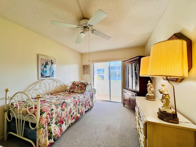 100 Sheffield E, West Palm Beach, FL 33417 - bedroom with access to outside, a textured ceiling, carpet floors, and a ceiling fan