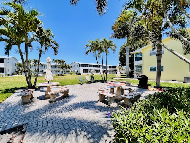 100 Sheffield E, West Palm Beach, FL 33417 - view of property's community featuring a yard and a residential view