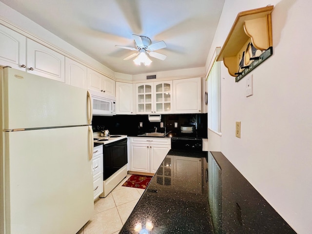 100 Sheffield E, West Palm Beach, FL 33417 - kitchen featuring white appliances, ceiling fan, white cabinets, glass insert cabinets, and dark stone counters