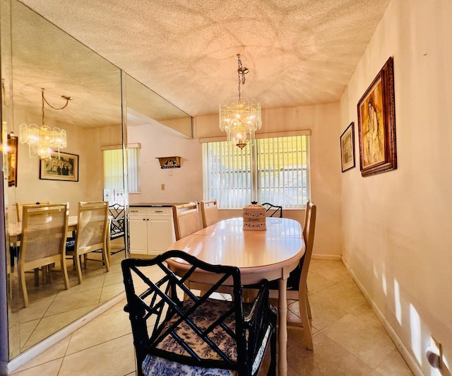 100 Sheffield E, West Palm Beach, FL 33417 - dining room featuring a chandelier, light tile patterned floors, and a textured ceiling