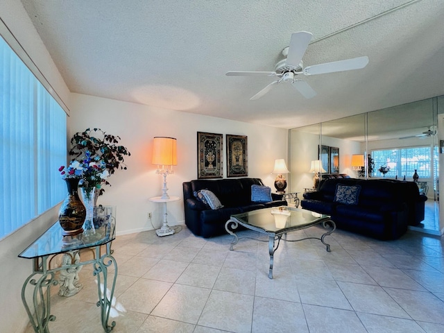 100 Sheffield E, West Palm Beach, FL 33417 - living room with a ceiling fan, tile patterned floors, and a textured ceiling