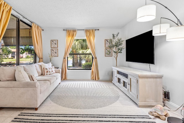 living area with a textured ceiling