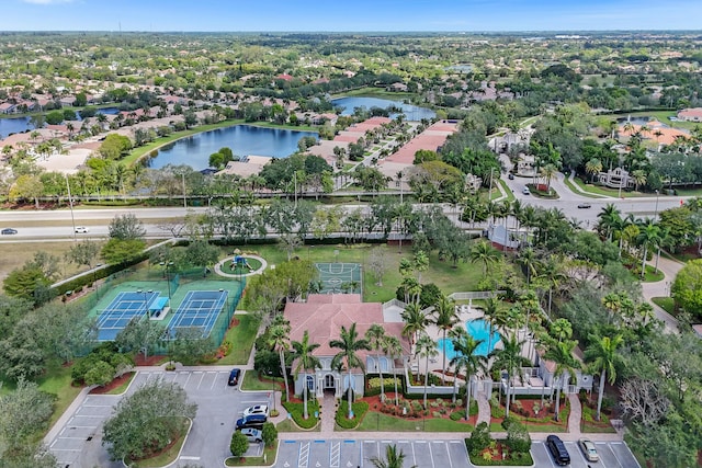 aerial view of residential area with a nearby body of water
