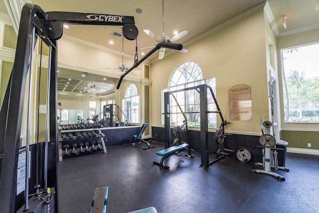exercise room with a ceiling fan, ornamental molding, baseboards, and recessed lighting