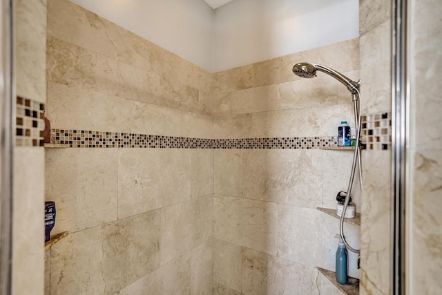 bathroom view of tiled shower