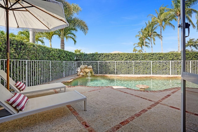view of pool featuring a patio area