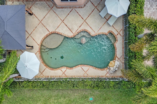 drone / aerial view of a pool