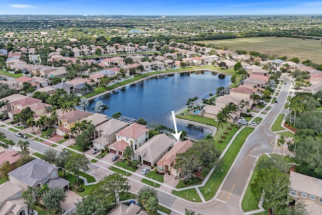 aerial perspective of suburban area with a large body of water