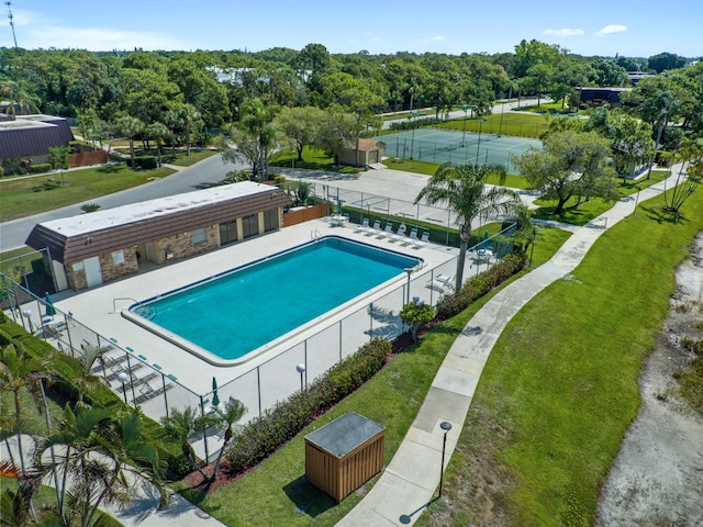 community pool featuring fence