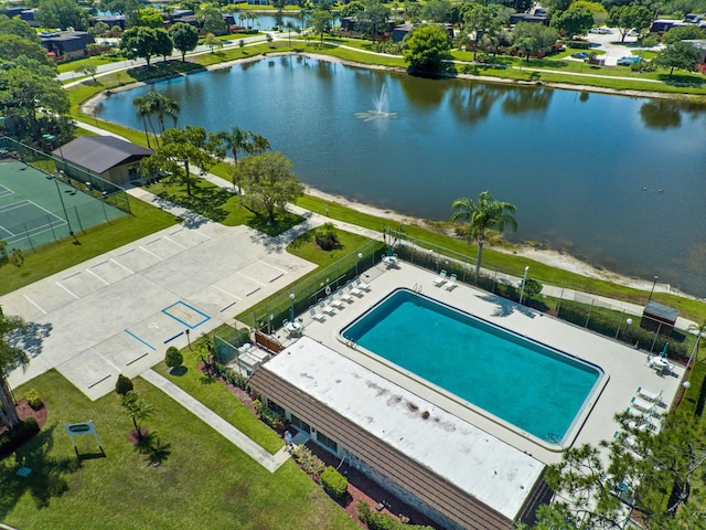 bird's eye view of a pool and a large body of water