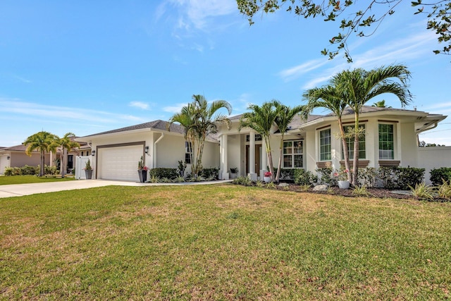 ranch-style home with stucco siding, an attached garage, concrete driveway, and a front lawn
