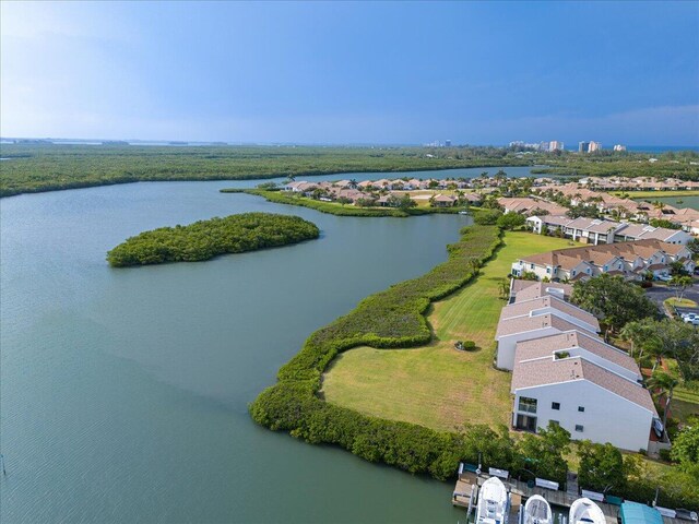 aerial view of residential area with a nearby body of water