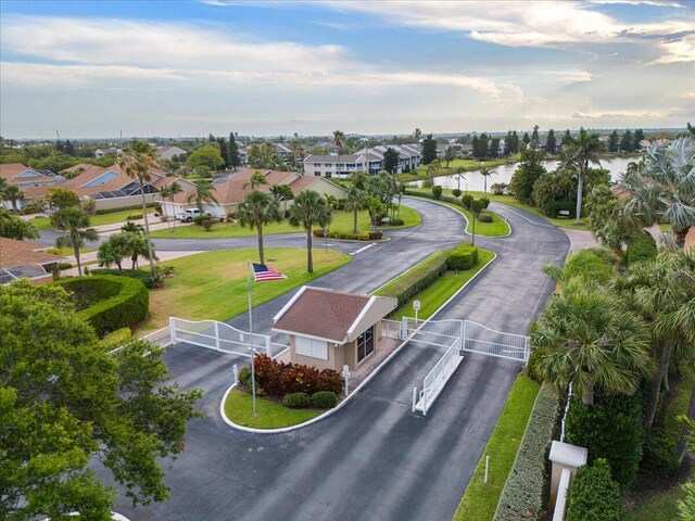 aerial perspective of suburban area featuring a large body of water