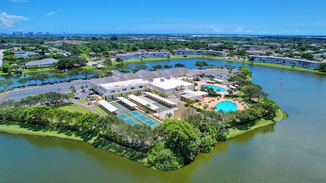 bird's eye view of a large body of water and a pool area