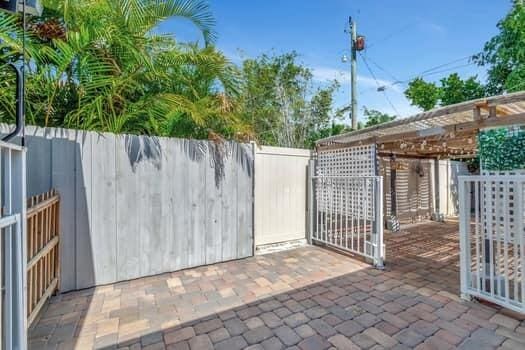 701 SW 1st Ave S, Boynton Beach, FL 33426 - view of patio / terrace featuring a fenced backyard