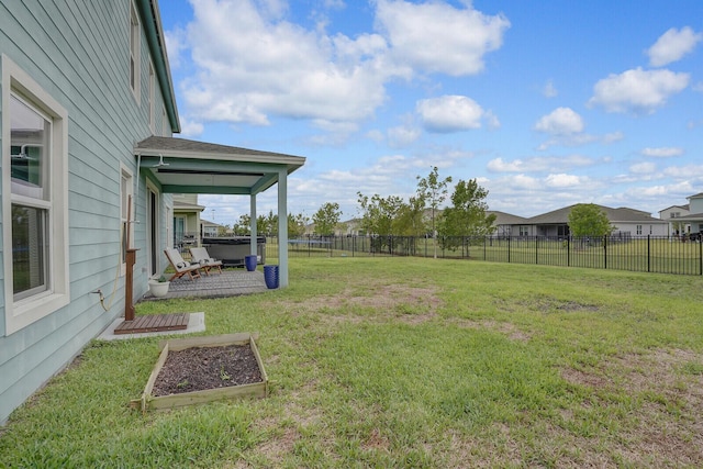 view of yard with a patio area and a garden
