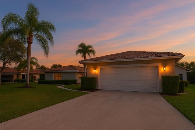 5450 Hawkes Bluff Ave, Davie, FL 33331 - single story home with concrete driveway, a front yard, an attached garage, and stucco siding