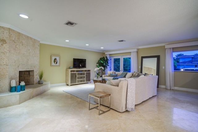 living room with ornamental molding, recessed lighting, baseboards, and a high end fireplace