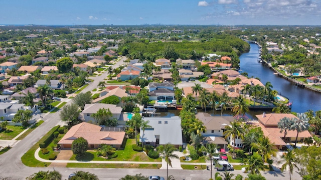 aerial perspective of suburban area featuring a nearby body of water