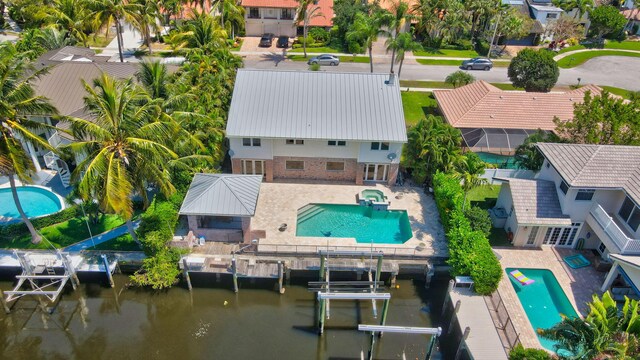 aerial perspective of suburban area with a pool