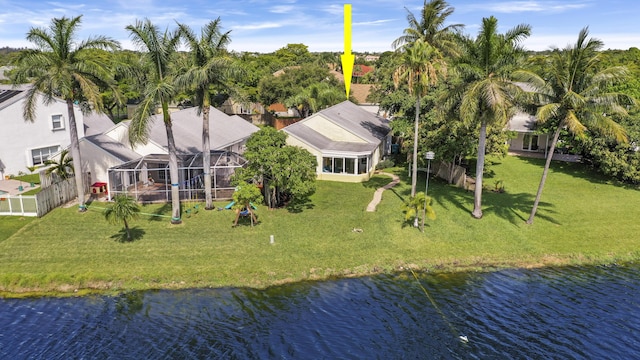 aerial view of residential area with a large body of water