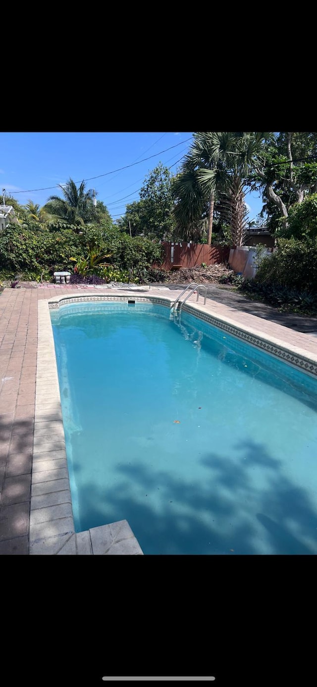 4420 NW 34th St, Lauderdale Lakes, FL 33319 - clothes washing area with washer and clothes dryer