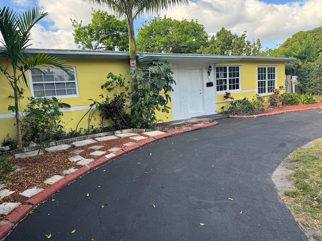 4420 NW 34th St, Lauderdale Lakes, FL 33319 - view of front of property featuring stucco siding