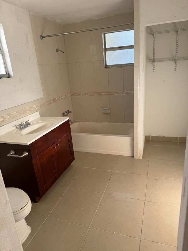 4420 NW 34th St, Lauderdale Lakes, FL 33319 - full bath featuring toilet, bathtub / shower combination, vanity, and tile patterned floors