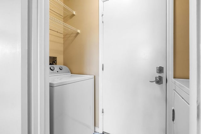 laundry area featuring separate washer and dryer