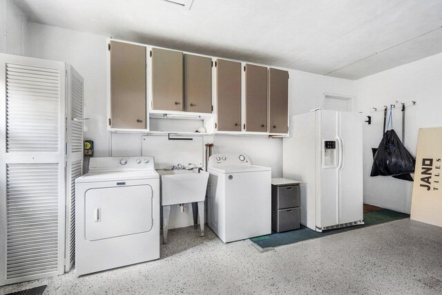 1467 NE 57th Ct, Fort Lauderdale, FL 33334 - washroom featuring cabinet space and washing machine and clothes dryer