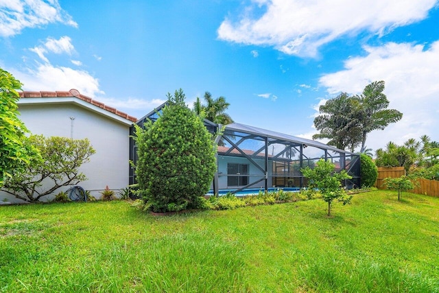 1467 NE 57th Ct, Fort Lauderdale, FL 33334 - view of yard with an outdoor pool and glass enclosure