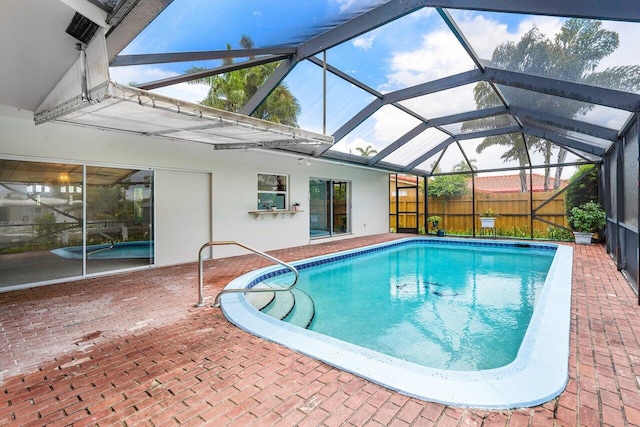 1467 NE 57th Ct, Fort Lauderdale, FL 33334 - view of pool featuring a patio, fence, and a lanai