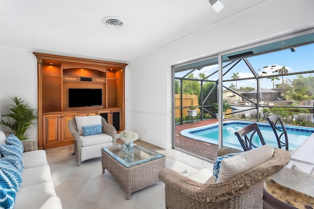1467 NE 57th Ct, Fort Lauderdale, FL 33334 - living room featuring a sunroom