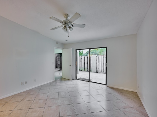 151 Meadows Dr, Boynton Beach, FL 33436 - empty room with a ceiling fan, baseboards, and light tile patterned floors